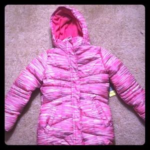 A  pink space dye Xersion Jacket